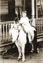 Annie Capper on a pony, c1915